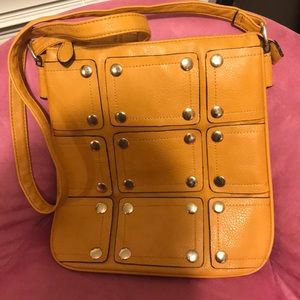 Mustard cross body purse.